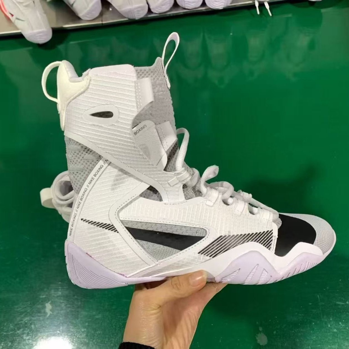 Buyer photo: white Nike HyperKO 2 shoe, side view