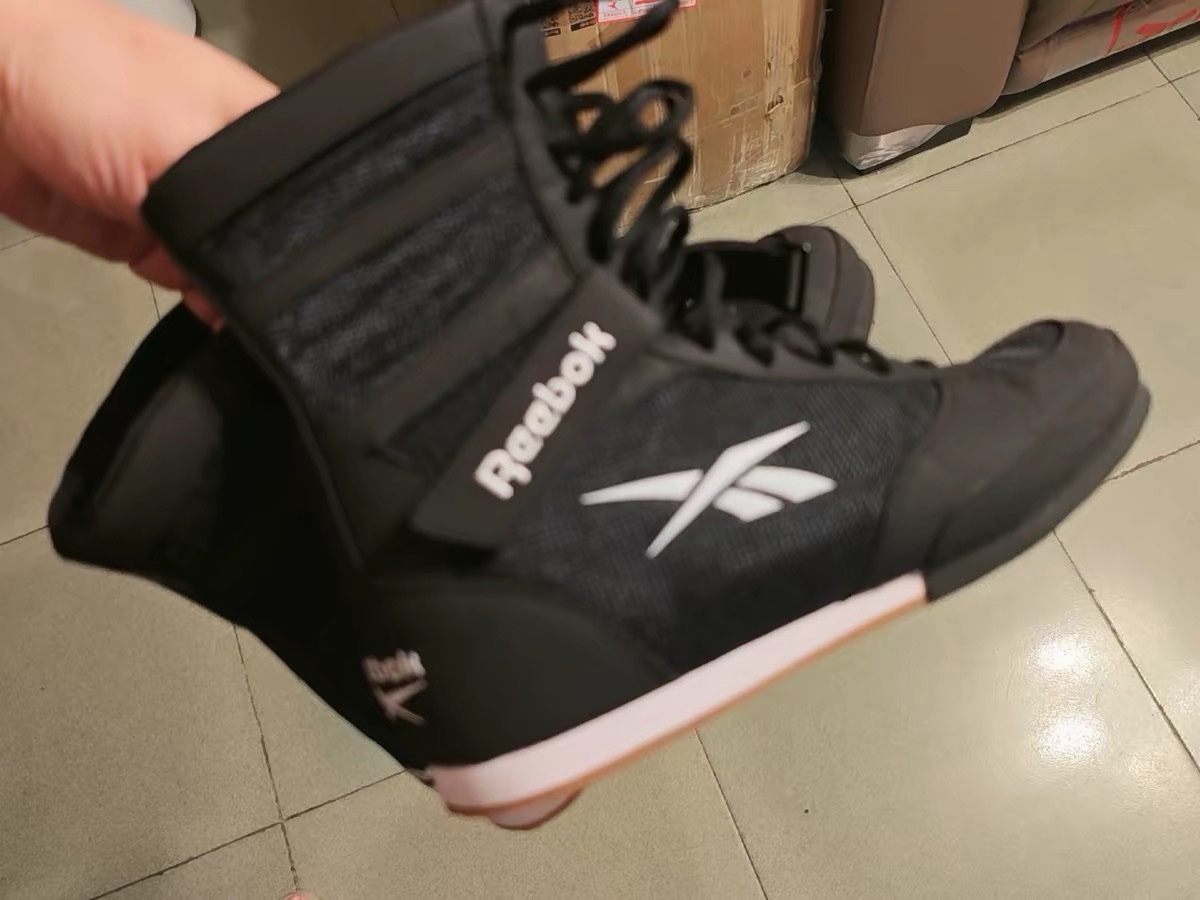 Buyer photo: black Reebok boxing boot, side view