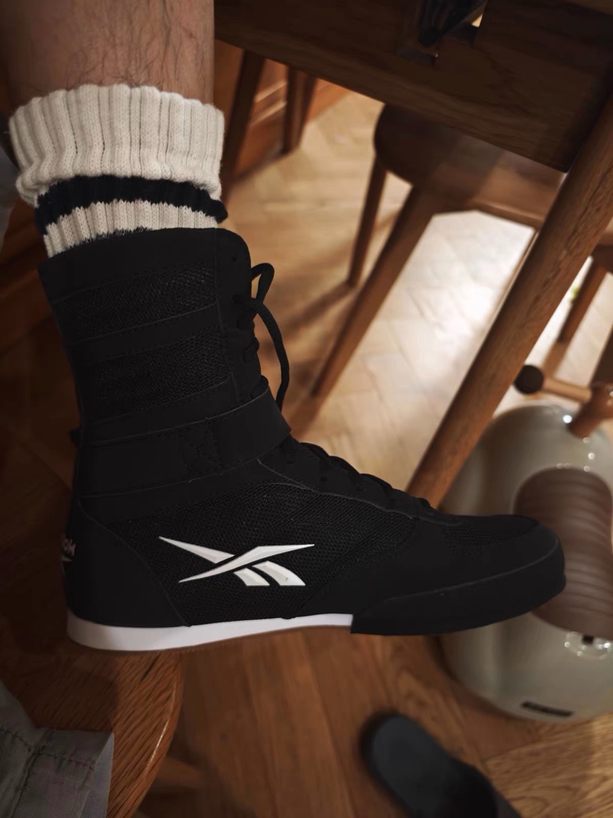 Buyer photo: black Reebok boxing boot worn on foot